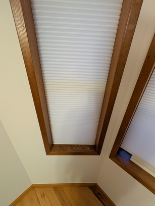 Perfectly fitted 16-inch motorized blind with no gaps