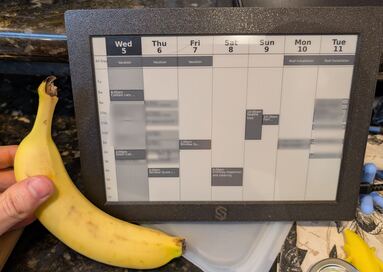 eink-calendar, banana for scale